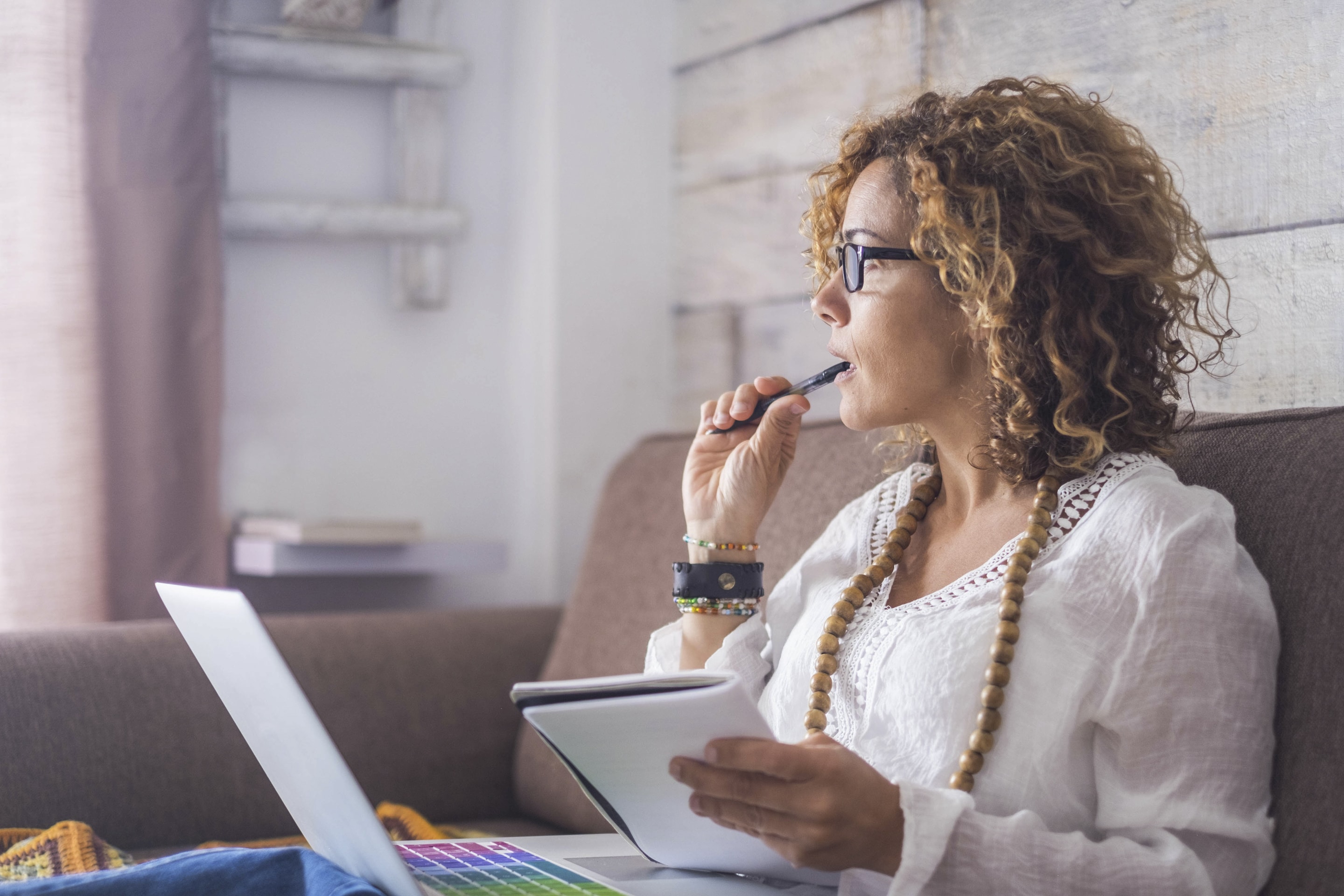 Nice Woman Type On A Laptop Working At Home Freedom And Happy Thinking Looking Outside