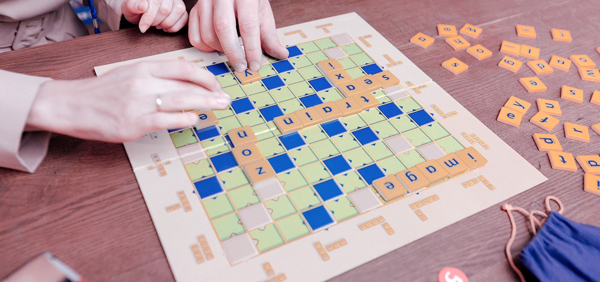 People playing scrabble